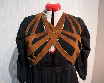 Thigh high slitted black gown with leather harness