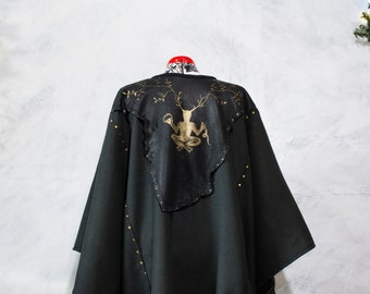 Poncho made of wool blend, pockets, and a Cernunos gold painted leather patch