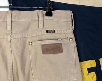 vintage brown tan Wrangler made in USA denim jeans size 33 x 34