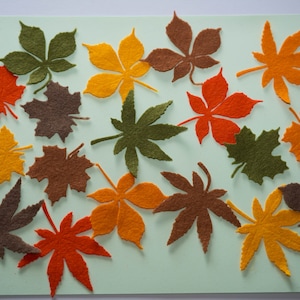 18 mixed autumn felt leaves for stitching or gluing: craft work sewing embroidery applique. 18 die cuts in three shapes and six colours.