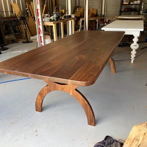 Handcrafted Walnut Dining Table: Modern Rustic Curved X-Base
