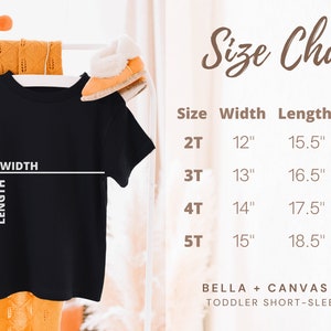 Op de afbeelding: Maattabel voor korte mouwen T-shirts voor peuters, met breedte, lengte en gewicht in inches en ponden. De maten omvatten 2T, 3T, 4T en 5T. De tabel is gelabeld "Bella + Canvas 3001T Toddler Short-Sleeve Tee."