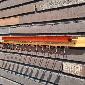 Italian tie holder designer Ico Parisi for Fratelli Reguitti, Mid Century, walnut and beech wood