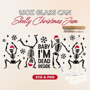 May include: A 16 ounce glass jar with a wooden lid. The jar is decorated with a design of skeletons wearing Santa hats and the text "Baby I'm Dead Inside".