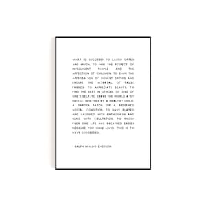 May include: A framed print with a black border features a quote by Ralph Waldo Emerson in black text on a white background. The quote discusses the meaning of success, with the author's name at the bottom.
