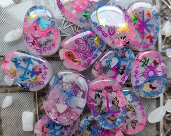 Iris, Goddess Of Rainbows, Glow-In-The-Dark, Rainbow Moonstone Crystal Witches Rune Set With Velvet Carrying Bag And Mini Black Light