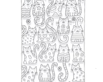 May include: Clear stamp sheet with 14 different designs of cats with various patterns. Each cat has a unique design, including polka dots, stripes, hearts, and stars.
