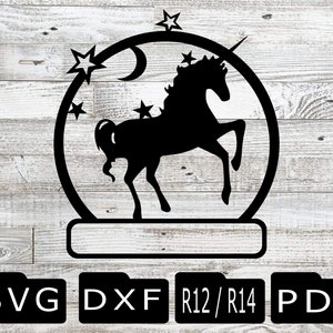 May include: Black silhouette of a unicorn inside a snow globe with stars and a crescent moon. The snow globe has a blank banner at the bottom.