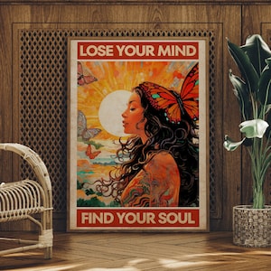 May include: A vintage-style poster with a woman with long dark hair and a butterfly on her head. The poster has the text "Lose Your Mind Find Your Soul" and features a sunset background with butterflies.