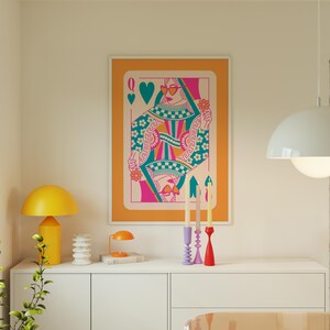May include: A retro-style illustration of the Queen of Hearts playing card. The queen is wearing sunglasses and a checkered dress with floral accents. The background is orange.