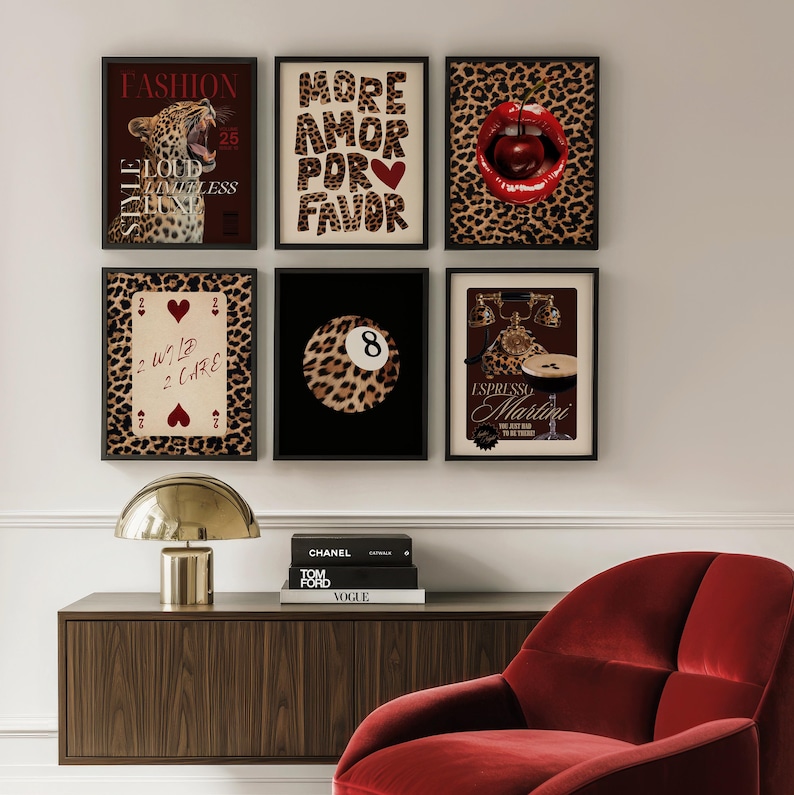 May include: Set of six framed prints with a leopard print background. The prints feature a leopard, a heart, a playing card, a pool ball, a cherry, and a cocktail.