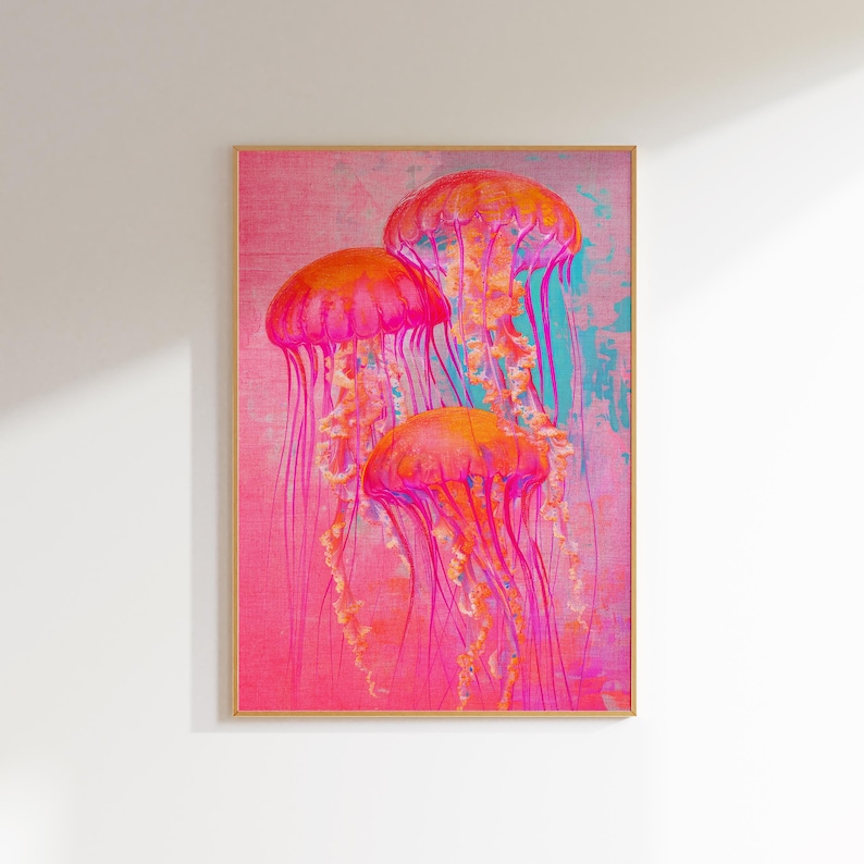 May include: A framed print of three pink jellyfish with long, flowing tentacles against a pink and blue background.