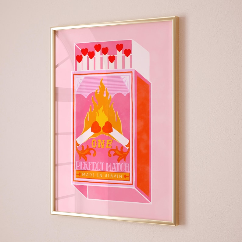 May include: A pink and orange matchbox with a flame and two crossed matches. The box says "One Perfect Match Made in Heaven".