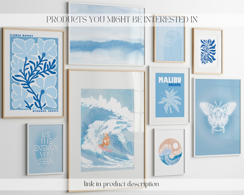 May include: A collection of eight blue and white framed prints with various designs, including a flower market scene, a wave with a surfer, a palm tree, a butterfly, and abstract designs. The prints are arranged on a white wall with the text "PRODUCTS YOU MIGHT BE INTERESTED IN" at the top.