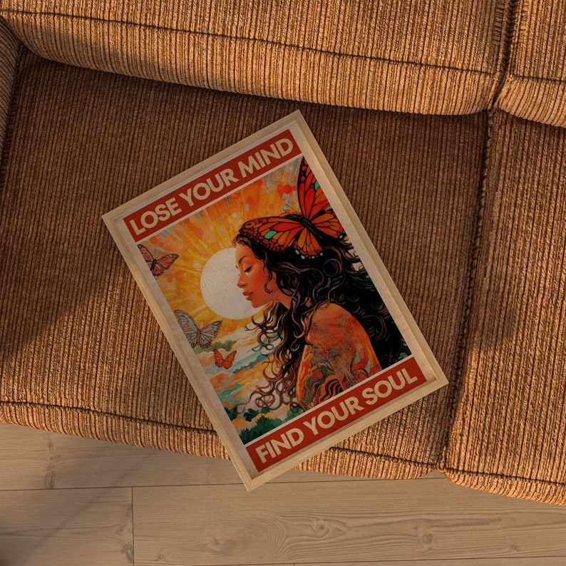 May include: A vintage-style poster with a woman with long dark hair and a butterfly on her head. The poster has a yellow, orange, and red color scheme and the text "Lose Your Mind Find Your Soul".