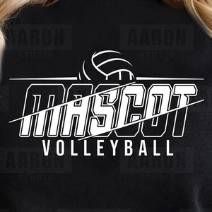 May include: Black and white graphic design with the word "MASCOT" in a bold font, with a volleyball graphic and the words "VOLLEYBALL" underneath. The design also includes the words "AARON STUDIO" on the top and bottom.