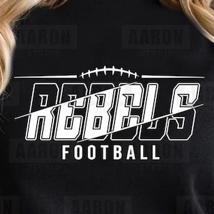 May include: Black and white graphic design of the word "Rebels" with a football graphic and the text "Football" underneath.