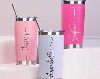 May include: Three stainless steel tumblers with personalized names, "Sophia", "Jessica", and "Annabelle", in pink, purple, and light blue colors. Each tumbler has a straw.