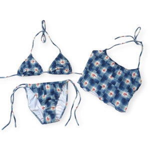 May include: A blue and white floral print bikini set with a triangle top and a high-waisted bottom.