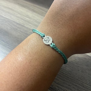 Sea Green Ohm Rakhi Bracelet | Adjustable Rakhi | One Size | Raksha Bandhan Gifts