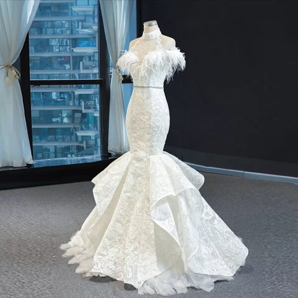 BEADED FEATHER EVENING GOWN