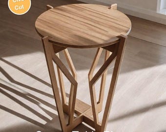 Può includere: Un tavolino angolare in legno con piano rotondo e gambe geometriche. Il tavolo è realizzato in legno chiaro e presenta il testo "CNC Cut" e "Corner Table Plans". Il design è moderno e adatto a vari stili di interni.