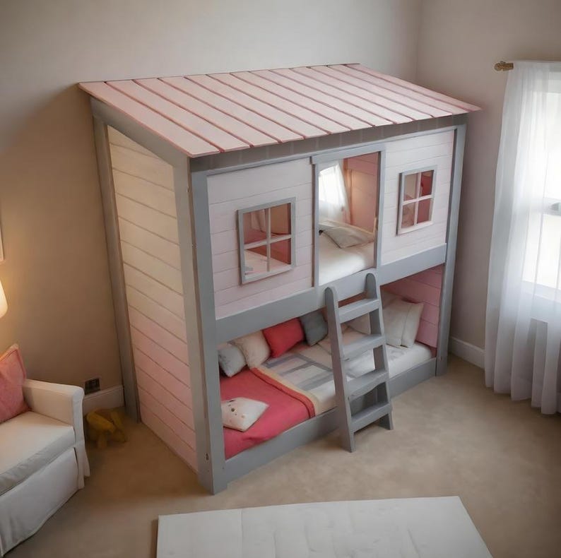 May include: A bunk bed designed like a small house with a light pink roof, gray frame, and white horizontal siding. The structure features two levels, each with a mattress, windows, and a gray ladder attached to the front for access to the top bunk.