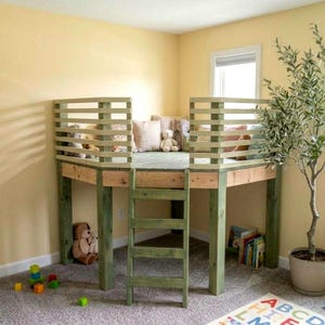 May include: A wooden loft bed with a light green finish, featuring a slatted safety railing, a built-in ladder, and a platform base. The bed is decorated with several plush stuffed animals and pillows, creating a raised sleeping area.