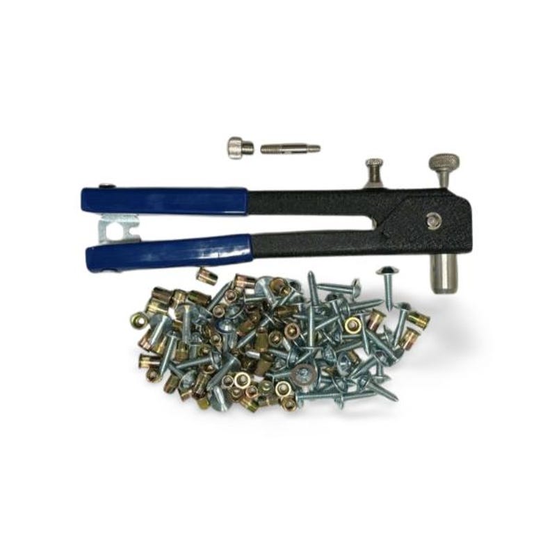 May include: A black rivet gun with blue handles is displayed with a collection of rivets and fasteners. The fasteners are a mix of silver and gold colors, and the rivet gun is designed for mechanical fastening.