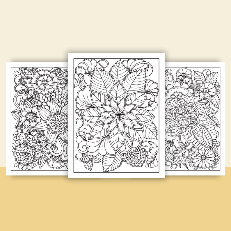 May include: Three black and white coloring pages featuring intricate floral designs. Each page features a different floral pattern with detailed leaves, petals, and swirls.