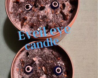Evil eye protection candle, tiger eye. black obsidian crystals and herbs