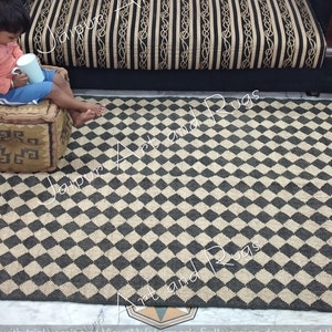 Handmade Jute Wool Checkerboard Rug: Black & Natural Dhurrie