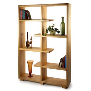 May include: A wooden bookshelf with multiple shelves and open compartments. The shelves are arranged in a staggered pattern. The bookshelf is decorated with books, vases, and a potted plant.