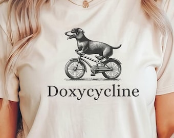 Doxycycline Pharmacy Pun T-Shirt, Dachshund On Bicycle, Funny Pharmacists Shirt, Veterinary Shirt, Vet Tech Gift, Funny Dachshund Tee, Gift
