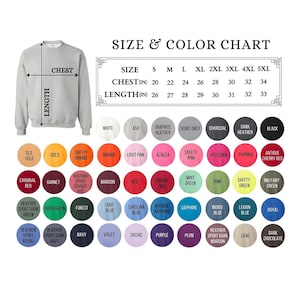Op de afbeelding: Een lichtgrijs sweatshirt met een maat- en kleurentabel. De tabel toont borst- en lengtematen in cm, vari&euml;rend van 51 tot 86 cm. Er wordt een breed scala aan kleuren getoond, waaronder wit, zwart en verschillende tinten rood, blauw en groen.