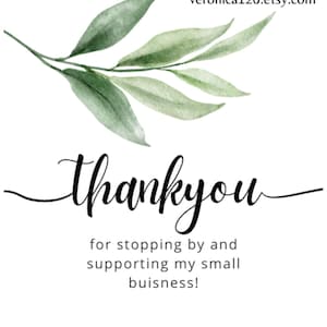 May include: A white card with the words "thank you" in elegant black script, accompanied by a watercolor illustration of green leaves. The text "for stopping by and supporting my small business!" is also included.