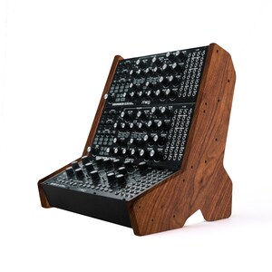 May include: A black synthesizer with a wooden stand. The synthesizer has a variety of knobs and buttons, and the stand is made of dark wood.