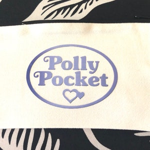 ポリー ポケット ジッパー付きメイクアップ バッグまたはコットン ケース、ジッパー付きビューティー ケース、前面にポリー ポケット プリント