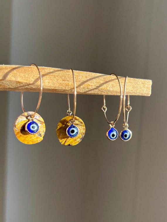 Hoop earrings in gold with yellow shell plate and Nazar lucky eye