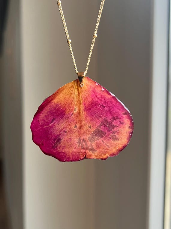 Necklace pendant made of a real red rose petal and gold clasp
