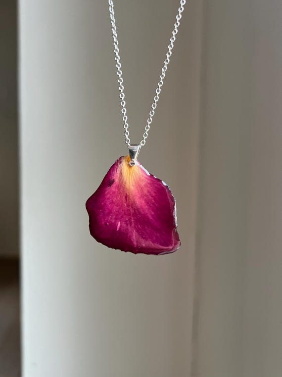 Necklace pendant made of a real red rose petal and silver clasp
