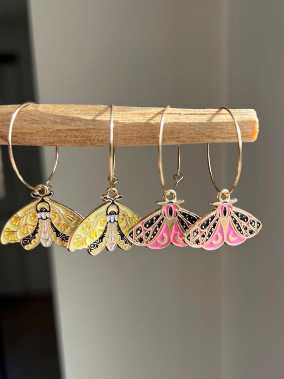 Hoop earrings in gold magical fairy moth butterfly charm yellow and pink night fairy