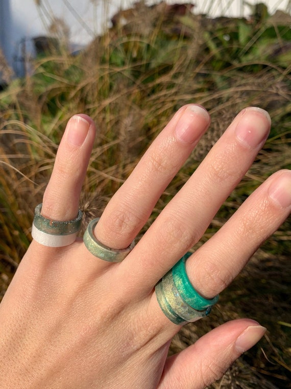 Rings made of resin epoxy resin green gold white synthetic resin
