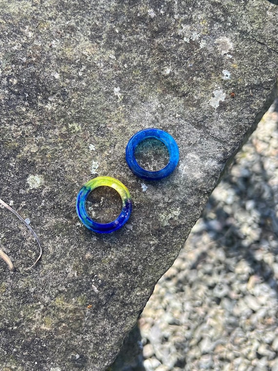 Resin rings in blue and yellow synthetic resin epoxy resin handmade shimmering