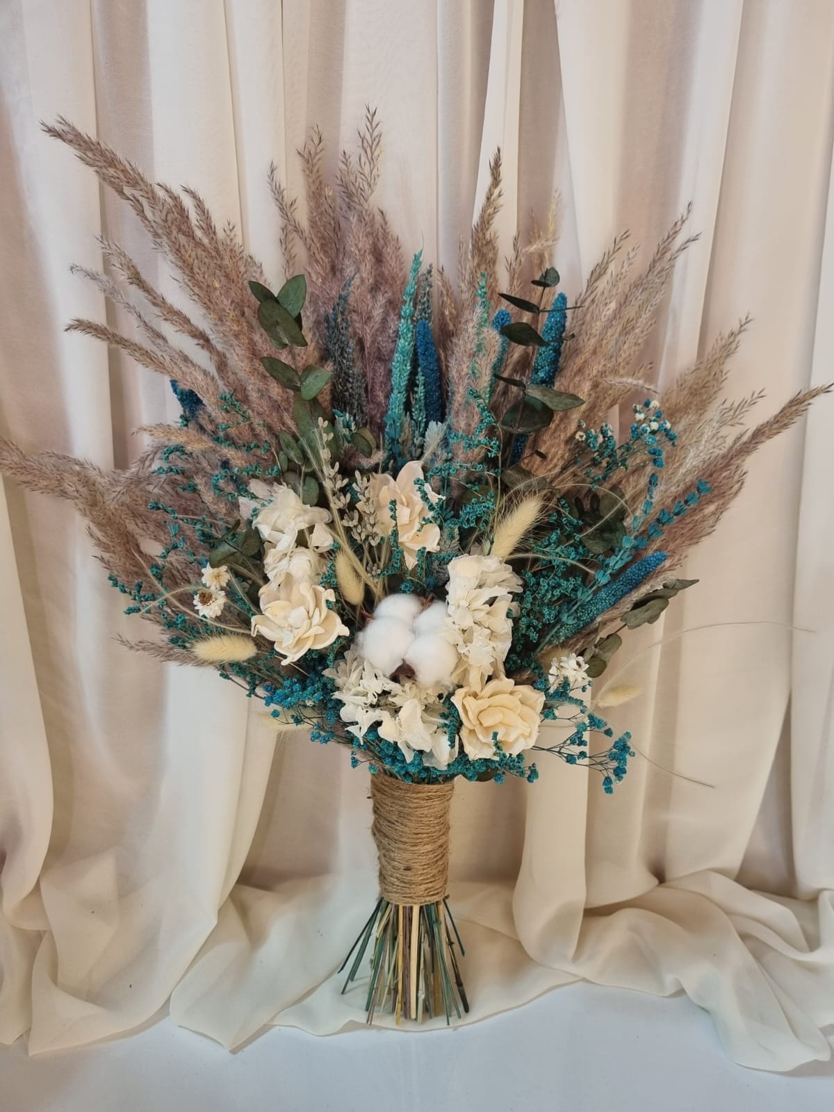 ターコイズドライフラワーのブートニア：結婚式の花婿付添人用