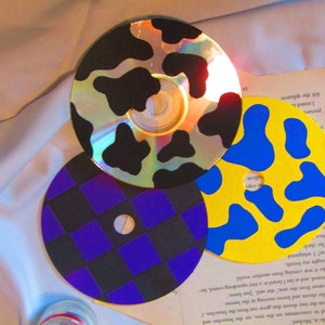 Patterned acrylic CD paintings