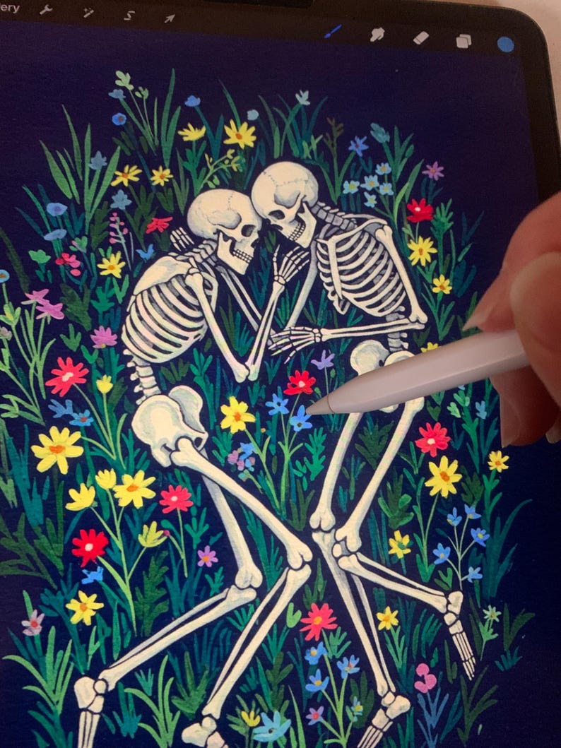 May include: Two skeletons are lying in a field of colorful flowers. The skeletons are embracing each other, with their arms wrapped around each other's waists. The flowers are a variety of colors, including red, yellow, blue, and pink. The background is a dark blue.