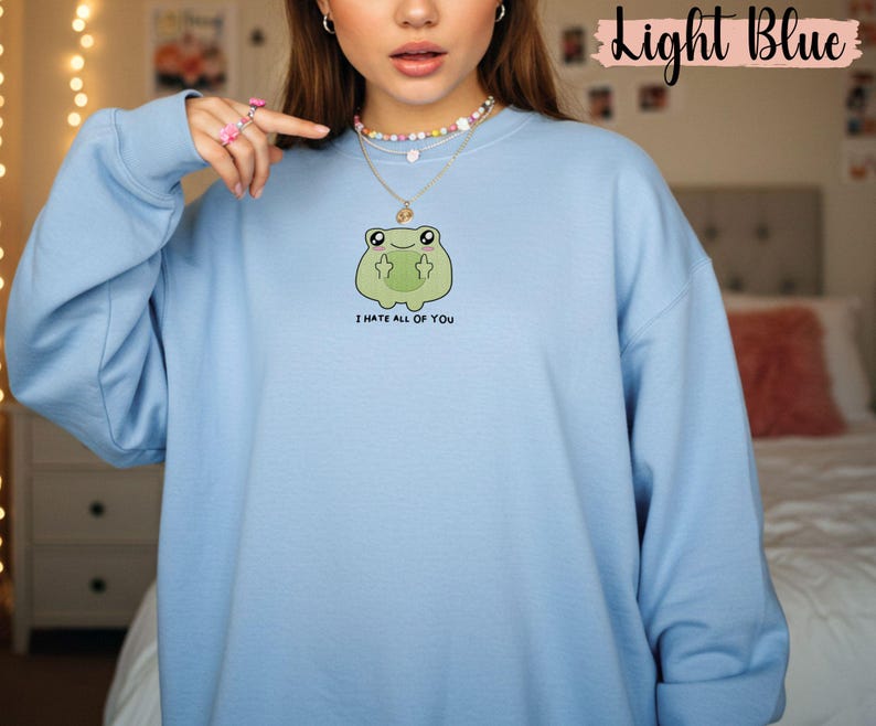 Frog flipping the bird with the text i hate all of you in black below Embroidered Sweatshirt Funny Frog Gift Goblincore Frog Lover Gift Cool Frog Outfit Frog Retro Meme Green Frog Embroidered Crewneck