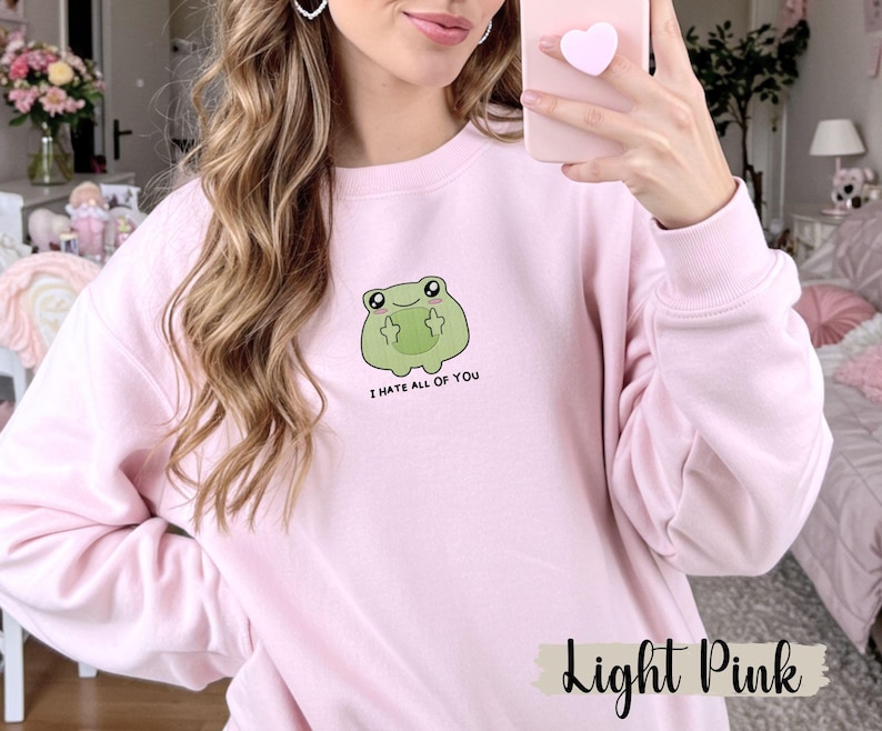 Frog flipping the bird with the text i hate all of you in black below Embroidered Sweatshirt Funny Frog Gift Goblincore Frog Lover Gift Cool Frog Outfit Frog Retro Meme Green Frog Embroidered Crewneck