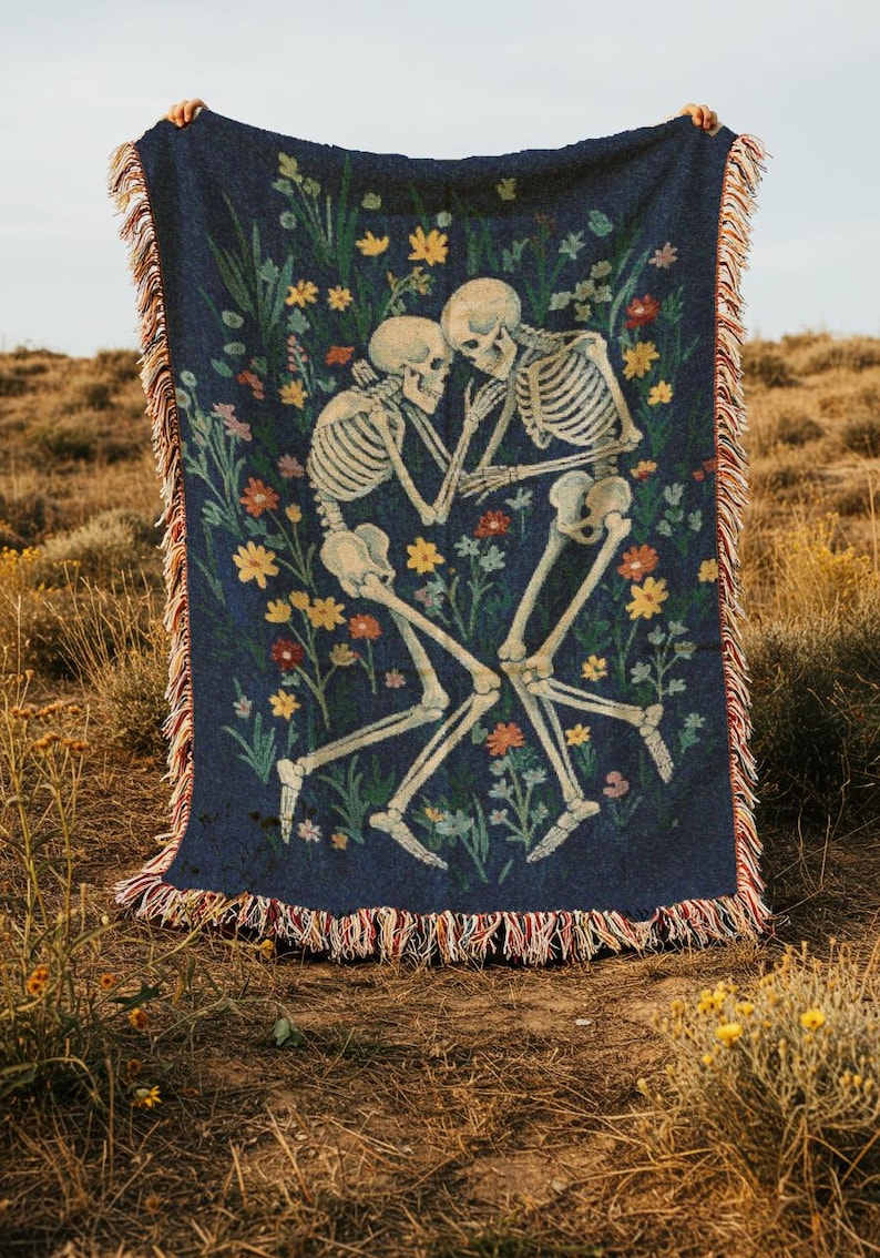 Skeletons laying together in a flower field throw blanket, inspired by in a week by hozier tapestry